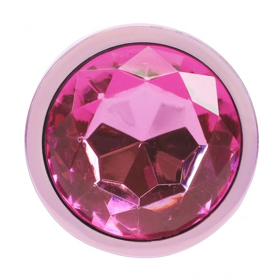 Descubra a sofisticação da International by Ouch! com o Conjunto de Plugs de 3 Peças da Coleção Paris. Com um acabamento rosa deslumbrante e bases incrustadas com joias, estes plugs de alumínio suave combinam luxo e praz