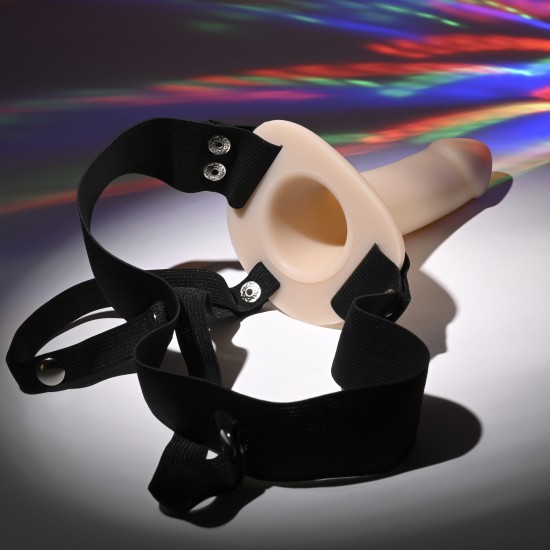 Este dildo oco com tiras para vestir possui uma haste macia e sedosa com uma cabeça cônica e é removível para limpeza. As tiras do arnês são elásticas na cintura e nas pernas, com tiras para as pernas totalmente ajustáve
