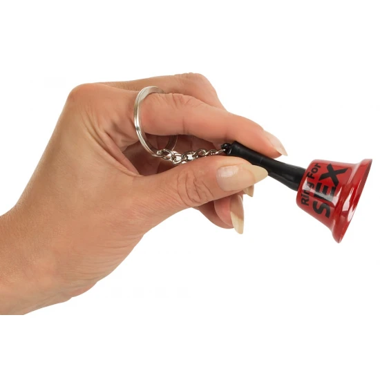 Porta Chaves Ring for Sex A perfect item for your shop counter! Keyring in the shape of a red bell. It has a black handle and black text ("Ring for Sex"). Length 6.5 cm, Ø 3.7 cm. Metal.