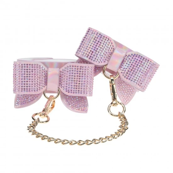 Paris Collection - Algemas Tornozelos - Rosa Os Paris Collection Algemas Tornozelos da Ouch! são ajustáveis em tamanho e são facilmente fixados juntos ou em outros objetos. Feitos de couro sintético, eles apresentam um acabamento iridescente em seu hardware, dand